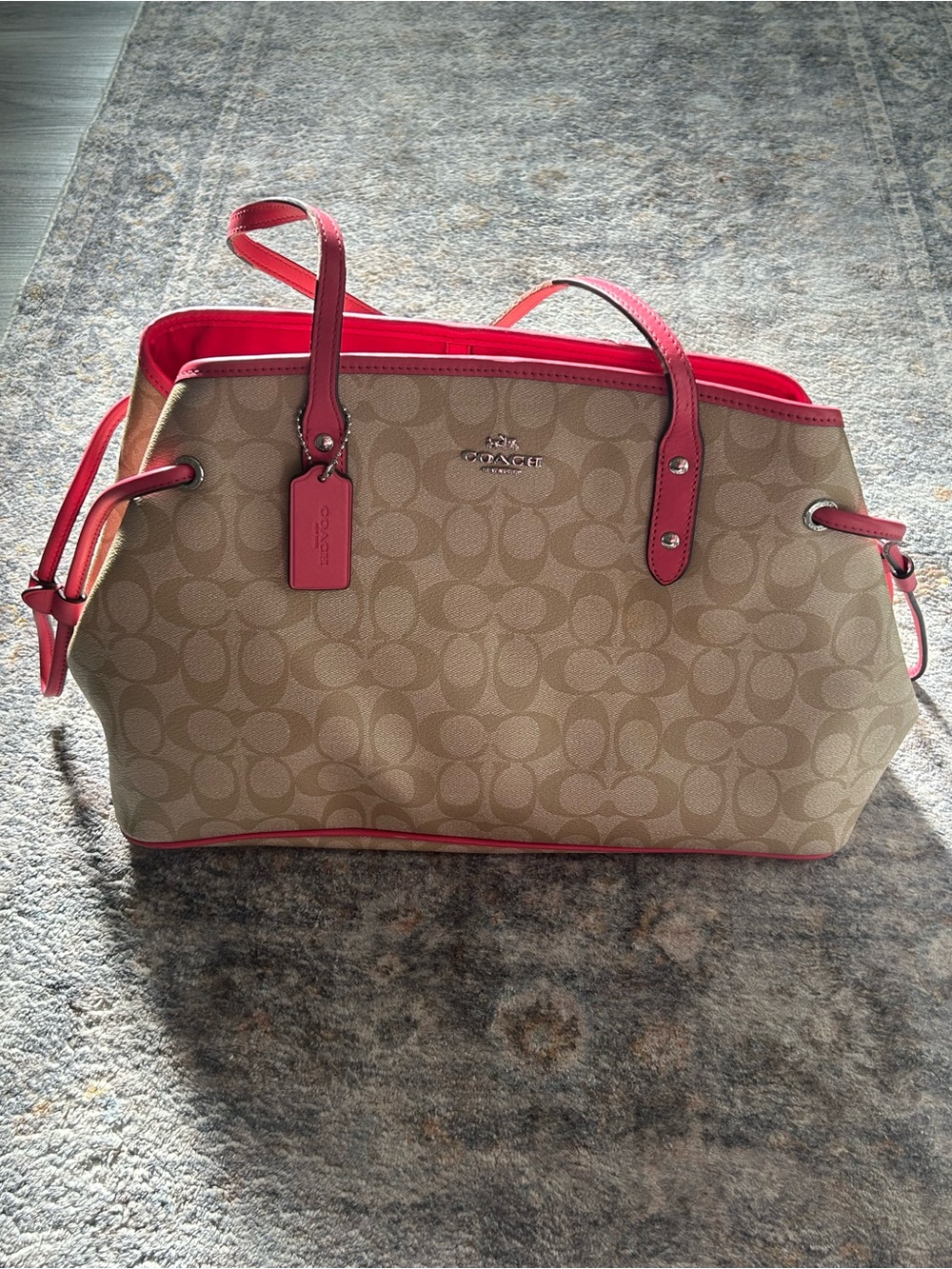Coach Signature Drawstring Carryall Tote in beige and pink